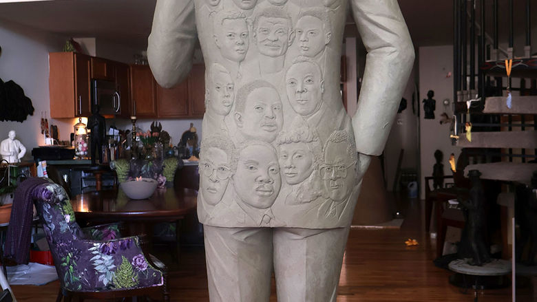 Shows the final details in the back of the Lawson statue.