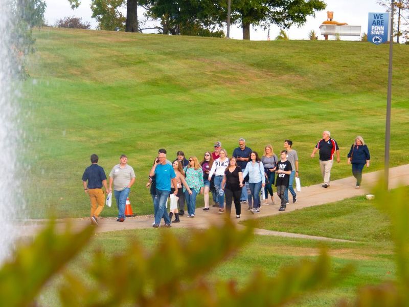 People walking across the Fayette campus.