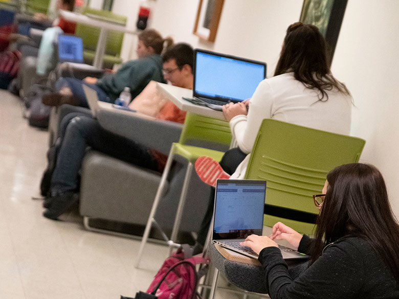 Students working on computers in the Biomedical building.