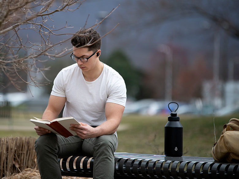 Student studying on campus.