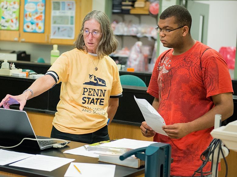 Professor working with a student.