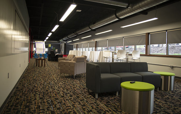 View of the couches and cubicles. 