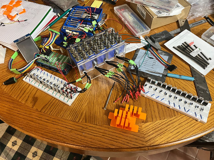 Circuit boards spread across a table.