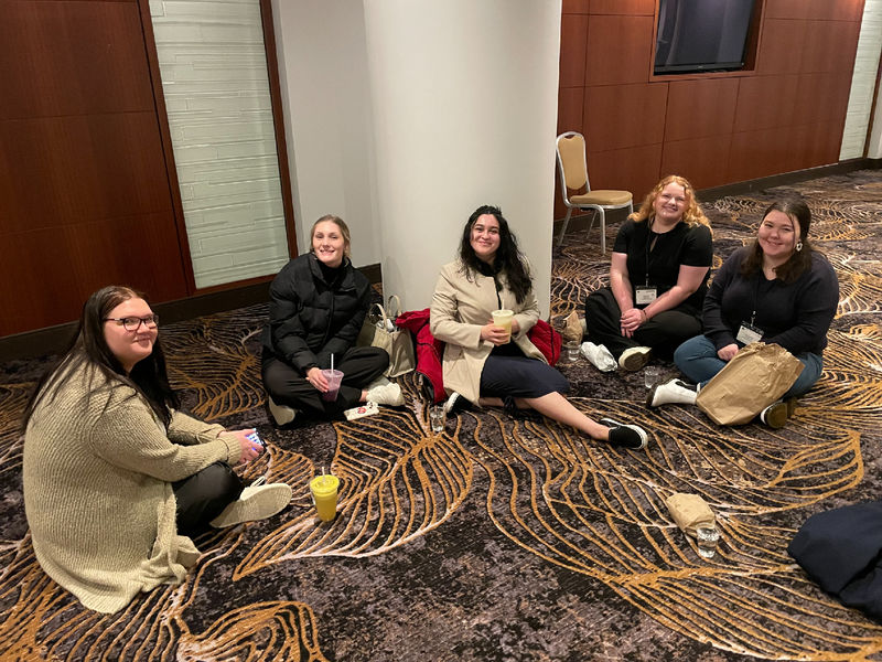 Students relaxing at the Eastern Psychological Association conference.