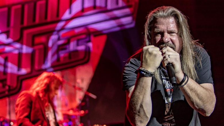 Lead vocalist performs on stage for Hollywood Nights: The Bob Seger Experience.
