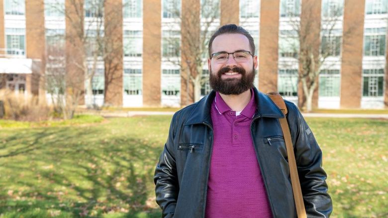 Joshua Krause standing outside Penn State Fayette.