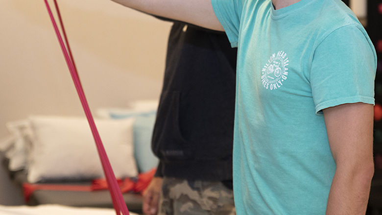 Two Physical Therapist Assistant students in class.