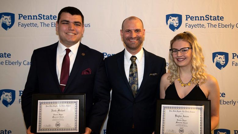 Chad Long, director of student affairs (center) with Noah Michael (left) and Kaylee Aaron (right), winners of the Dennis Hippo Memorial Award.