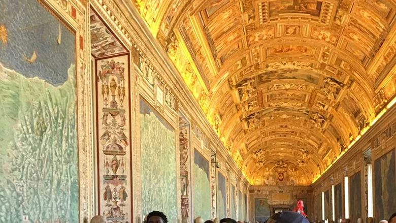 Students at the gallery of maps in the Vatican museum.