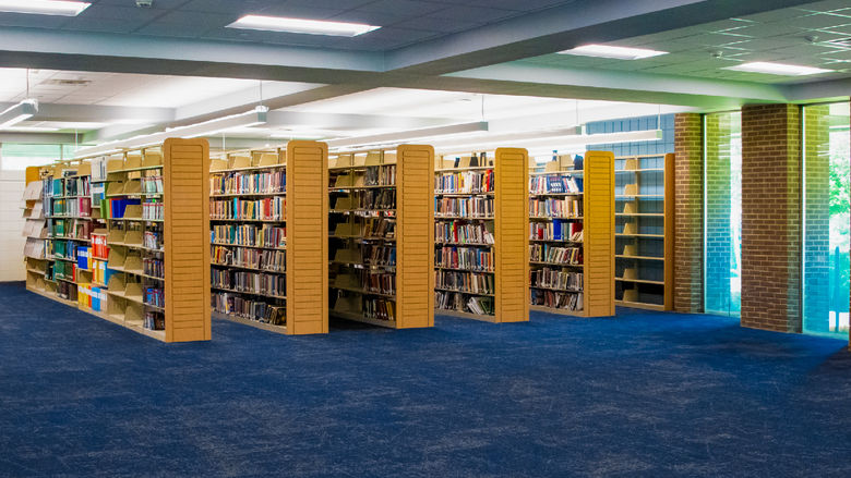 Penn State Fayette's library with new blue carpeting and paint.