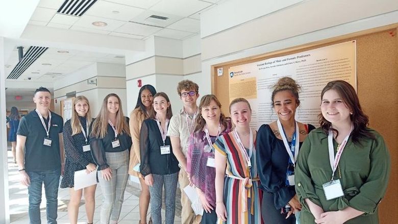 Aris Karagiorgakis, assistant professor of psychology; students Ashley Stangroom, Kerstin Nutt, Pasepa Buwawa-Driso, Kenadi Erdely, and Tyler Miller; Elaine Barry, associate professor of human development and family studies; and students Adriana Gebe, Serenity Robinson, and Mary Byers.