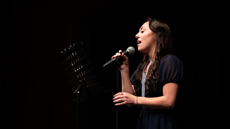 Annamarie Ball performing "The Climb" by Miley Cyrus.