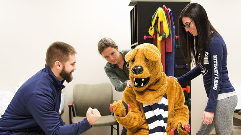 PTA students working with the Lion. 