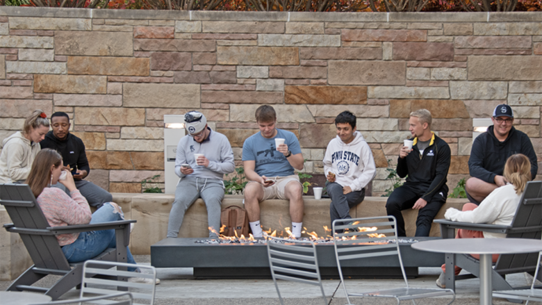 Students socialize at Outdoor Lounge dedication