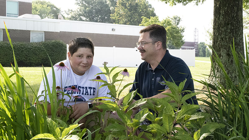 Matthew and Damien Zsiros in the garden.