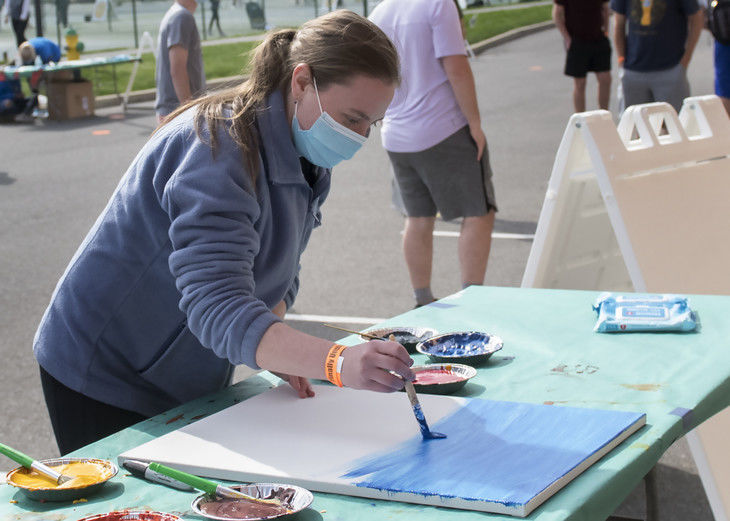 Maria Schultheis participates in the 'Pandemic Paint Party' event at 'Finally Unplugged' on April 23 at University Park.