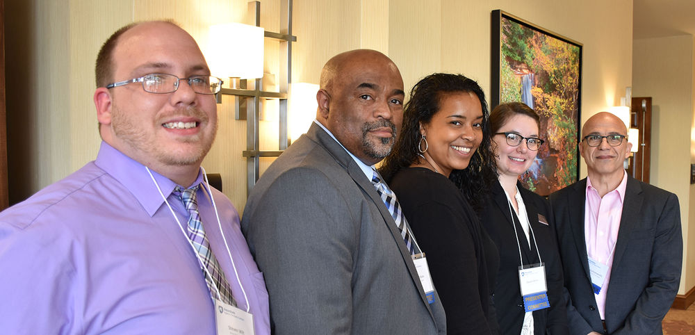 Steven Wilt, Kevin Debow, Gina Jones, Devon White, and keynote speaker Manny Contomanolis.