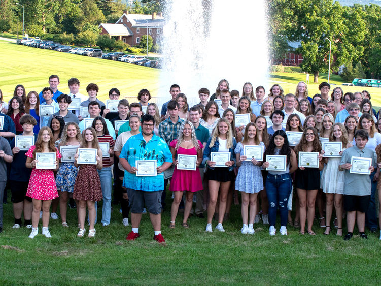 High school student recipients with their 4.0 Club certificates.