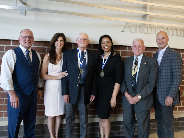 Award recipients posing with Advisory Board members.