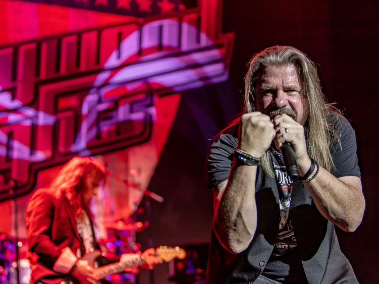 Lead vocalist performs on stage for Hollywood Nights: The Bob Seger Experience.