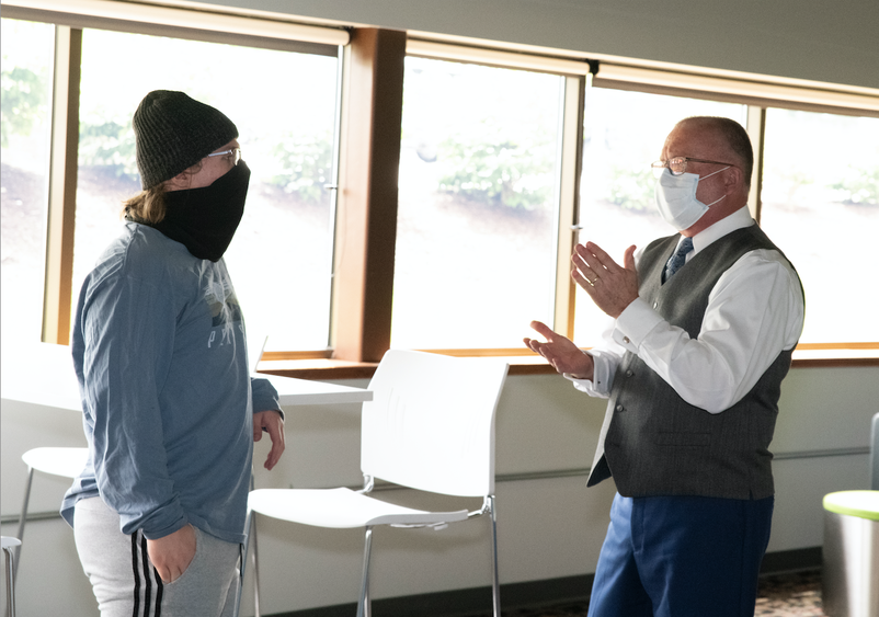 Erickson Discovery Grant Recipient Quentin Hales (left) with Chancellor Charles Patrick (right).