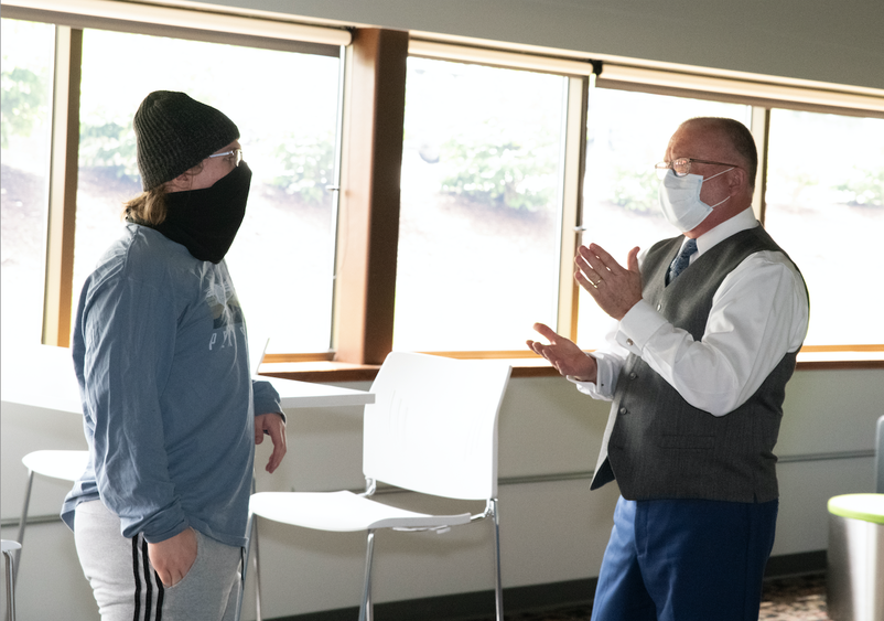 Erickson Discovery Grant Recipient Quentin Hales (left) with Chancellor Charles Patrick (right). 