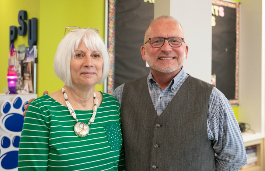 Cheryl Tkacs (left), instructional designer, celebrates her retirement from Penn State Fayette after fifteen years, with Charles Patrick (right), chancellor and chief academic officer.