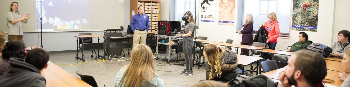 Students in class trying the VR equipment. 
